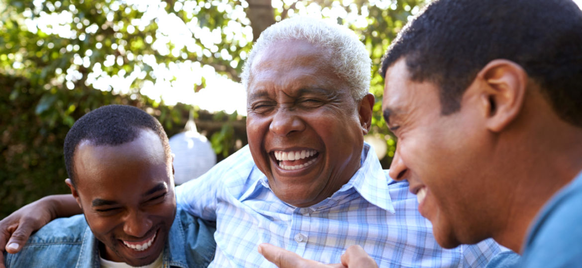 Dad with his two sons laughing