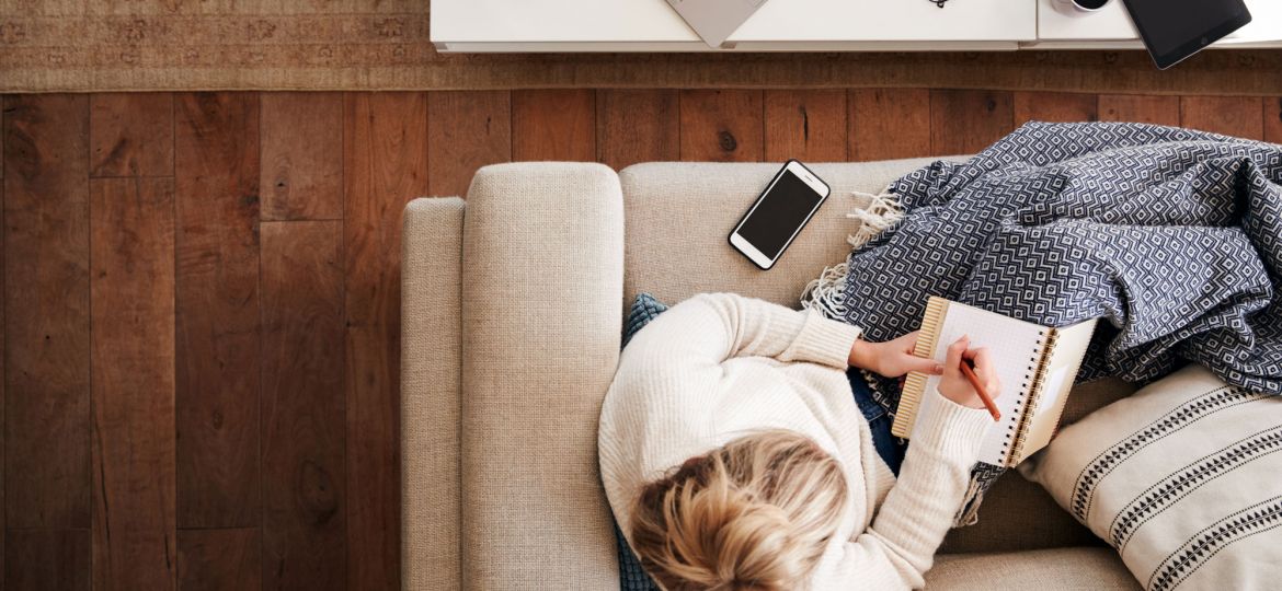 showing a person working remotely alone at home