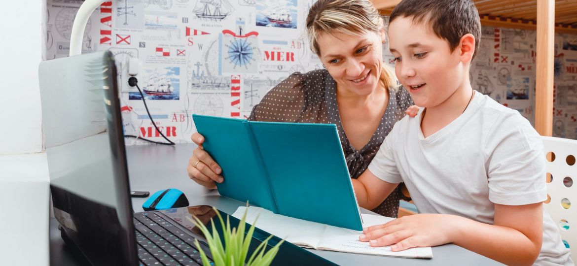 showing a mother and child working on homework