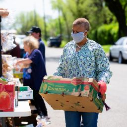 employees volunteering at food bank