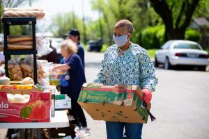 employees volunteering at food bank