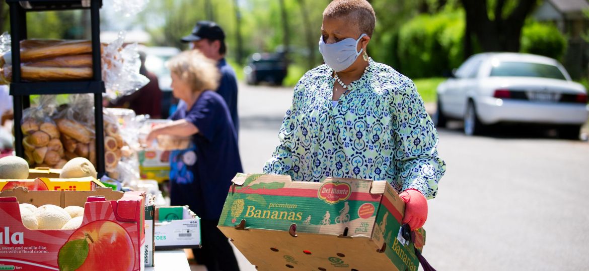 employees volunteering at food bank