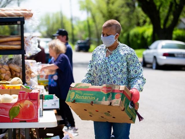 employees volunteering at food bank