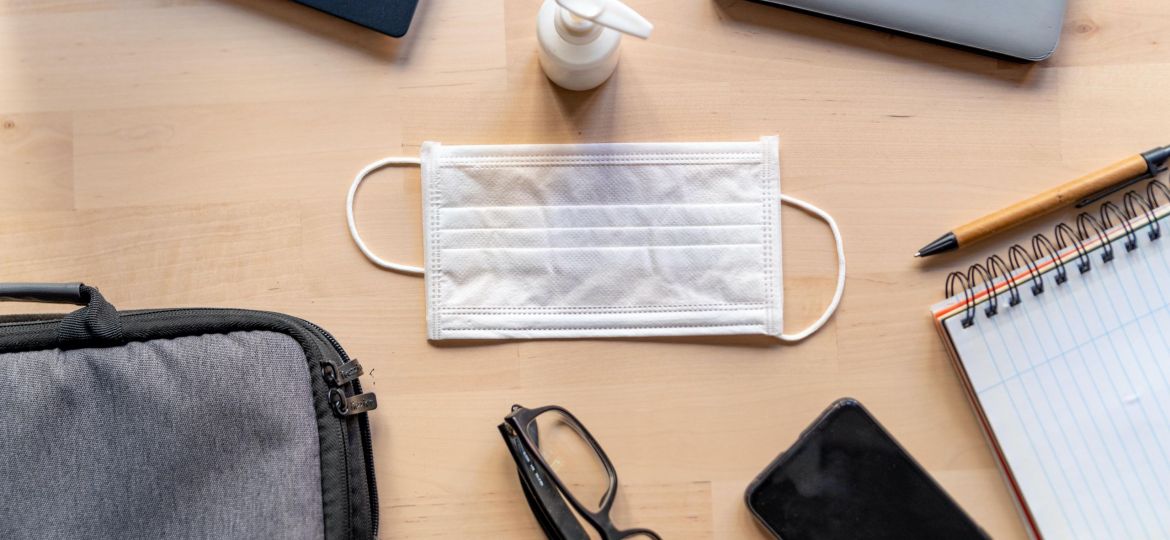 Remote,Work,Kit,On,Wooden,Office,Desk,With,Hand,Sanitizer