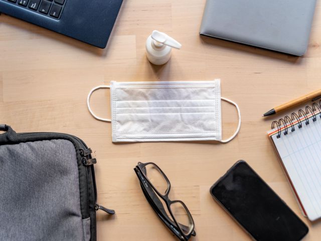 Remote,Work,Kit,On,Wooden,Office,Desk,With,Hand,Sanitizer