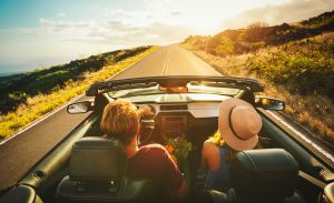 image of young couple on road trip