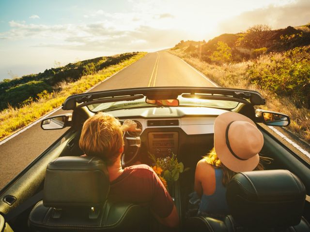 image of young couple on road trip