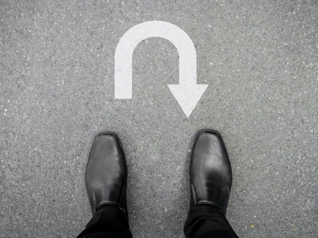 showing a person making a u turn