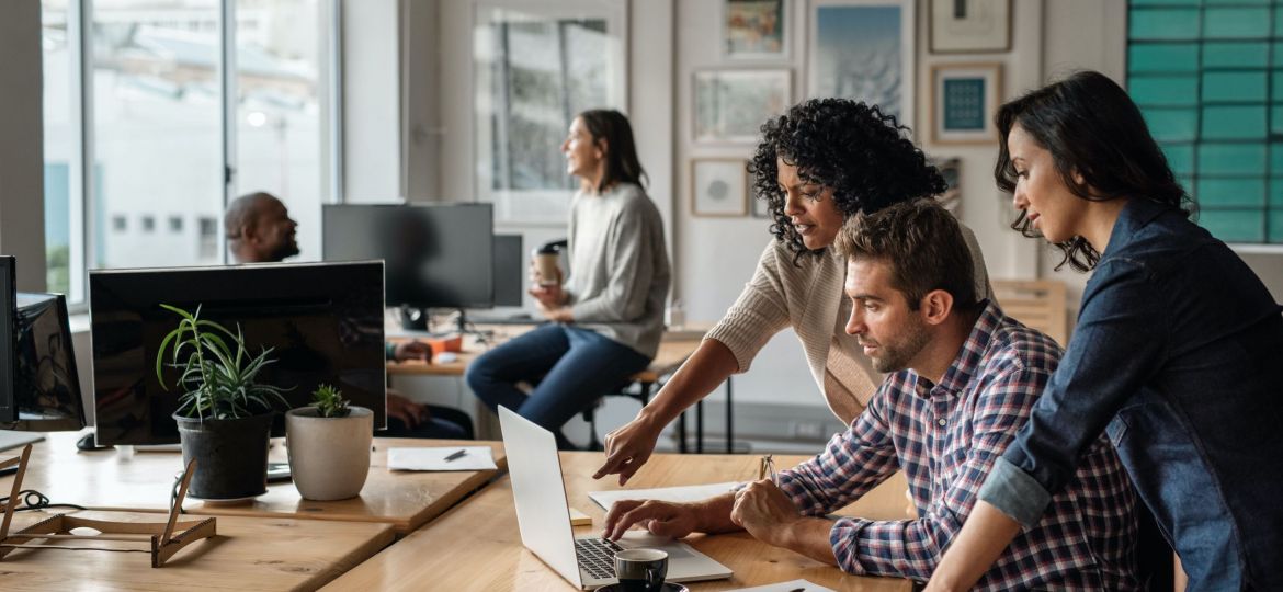 group of people working together in an office