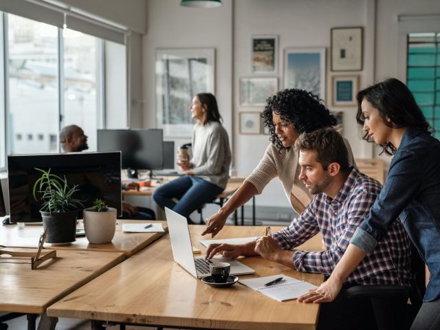 group of people working together in an office