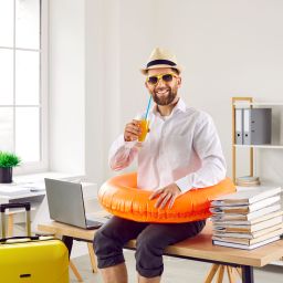 Funny office worker ready to go on summer holiday.